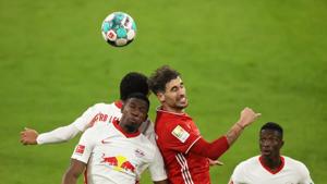 Soccer Football - Bundesliga - Bayern Munich v RB Leipzig - Allianz Arena, Munich, Germany - December 5, 2020 Bayern Munich's Javi Martinez in action with RB Leipzig's Nordi Mukiele Pool via REUTERS/Alexander Hassenstein DFL regulations prohibit any use of photographs as image sequences and/or quasi-video.(Pool via REUTERS) Soccer Football - Bundesliga - Bayern Munich v RB Leipzig - Allianz Arena, Munich, Germany - December 5, 2020 Bayern Munich's Javi Martinez in action with RB Leipzig's Nordi Mukiele Pool via REUTERS/Alexander Hassenstein DFL regulations prohibit any use of photographs as image sequences and/or quasi-video.(Pool via REUTERS)
