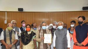 Former Bihar Deputy Chief Minister Sushil Kumar Modi, flanked by Chief Minister Nitish Kumar and his deputies Tarkishor Prasad, and Renu Devi receives the victory certificate at the Bihar Legislative Assembly after winning the Rajya Sabha bypoll on Monday.(PTI) Former Bihar Deputy Chief Minister Sushil Kumar Modi, flanked by Chief Minister Nitish Kumar and his deputies Tarkishor Prasad, and Renu Devi receives the victory certificate at the Bihar Legislative Assembly after winning the Rajya Sabha bypoll on Monday.(PTI)
