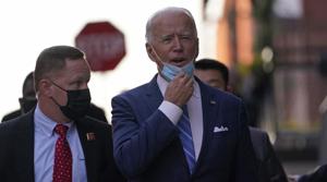 President-elect Joe Biden answers a question as he leaves The Queen theater in Wilmington, Del., Monday, Dec. 7, 2020. (AP Photo/Susan Walsh) President-elect Joe Biden answers a question as he leaves The Queen theater in Wilmington, Del., Monday, Dec. 7, 2020. (AP Photo/Susan Walsh)