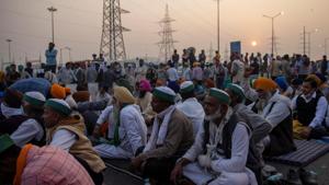 Thousands of farmers have gathered on Delhi’s borders to protest against the three farm laws enacted in September and have given a call for a nationwide bandh on Tuesday.(Reuters Photo) Thousands of farmers have gathered on Delhi’s borders to protest against the three farm laws enacted in September and have given a call for a nationwide bandh on Tuesday.(Reuters Photo)