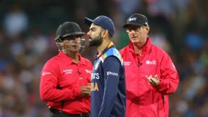 Cricket - Third Twenty20 International - Australia v India - Sydney Cricket Ground, Sydney, Australia - December 8, 2020 India's Virat Kohli with the umpires REUTERS/Loren Elliott(REUTERS) Cricket - Third Twenty20 International - Australia v India - Sydney Cricket Ground, Sydney, Australia - December 8, 2020 India's Virat Kohli with the umpires REUTERS/Loren Elliott(REUTERS)