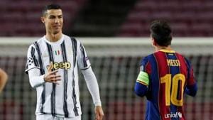 Soccer Football - Champions League - Group G - FC Barcelona v Juventus - Camp Nou, Barcelona, Spain - December 8, 2020 Juventus' Cristiano Ronaldo with FC Barcelona's Lionel Messi before the match(REUTERS)
