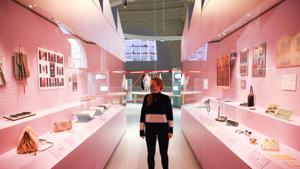 A museum employee poses next to a display of handbags that form part of the 'Bags: Inside Out' exhibition at the Victoria and Albert Museum in London.(REUTERS) A museum employee poses next to a display of handbags that form part of the 'Bags: Inside Out' exhibition at the Victoria and Albert Museum in London.(REUTERS)