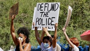 The protests sparked by Floyd's death in May thrust the defunding demand before city councils, including those in Minneapolis, Milwaukee and New York City.(AP/ File photo) The protests sparked by Floyd's death in May thrust the defunding demand before city councils, including those in Minneapolis, Milwaukee and New York City.(AP/ File photo)