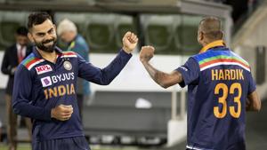 India's Virat Kohli, left, gestures with teammate India's Hardik Pandya(AP) India's Virat Kohli, left, gestures with teammate India's Hardik Pandya(AP)