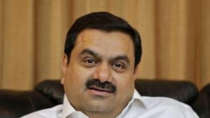With its name echoing in farmer protests against agri reform bills, Adani Group has said it neither buys food grains from farmers nor decides the pricing of food grains(REUTERS) With its name echoing in farmer protests against agri reform bills, Adani Group has said it neither buys food grains from farmers nor decides the pricing of food grains(REUTERS)