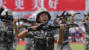 Soldiers of Chinese People's Liberation Army demonstrate their skill during an open day of Stonecutter Island naval base, in Hong Kong in August, 2019.(AP file) Soldiers of Chinese People's Liberation Army demonstrate their skill during an open day of Stonecutter Island naval base, in Hong Kong in August, 2019.(AP file)