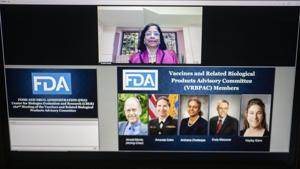 Prabhakara Atreya, acting designated federal officer of Vaccines and Related Biological Products Advisory Committee (VRBPAC), attends a virtual public meeting of the US Food and Drug Administration in Tiskilwa, Illinois, US on December 10.(Bloomberg) Prabhakara Atreya, acting designated federal officer of Vaccines and Related Biological Products Advisory Committee (VRBPAC), attends a virtual public meeting of the US Food and Drug Administration in Tiskilwa, Illinois, US on December 10.(Bloomberg)