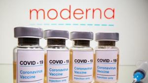 Vials with a sticker reading, Vials with a sticker reading,