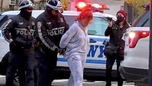 A woman is taken into police custody after a vehicle she drove plowed into a crowd of about 50 people at a protest Friday afternoon in Manhattan, New York, with multiple people injured, according to a spokesman for the New York City Police Department, in the US(via REUTERS)