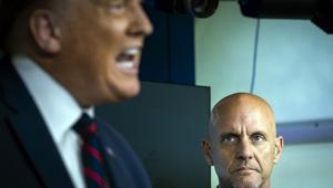 FDA Commissioner Stephen Hahn listens as President Donald Trump announces that the Food and Drug Administration is issuing an emergency authorisation for blood plasma as a coronavirus treatment during a press conference in August.(AFP file) FDA Commissioner Stephen Hahn listens as President Donald Trump announces that the Food and Drug Administration is issuing an emergency authorisation for blood plasma as a coronavirus treatment during a press conference in August.(AFP file)
