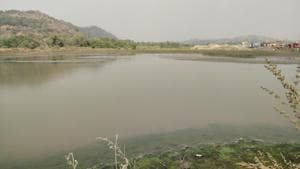 Bhendkhal where tankers are being used to drain water from the site.(HT Photo)