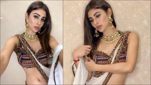 Mouni Roy shows how to slay at a winter wedding in tie-dye drape saree(Instagram/imouniroy) Mouni Roy shows how to slay at a winter wedding in tie-dye drape saree(Instagram/imouniroy)