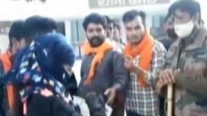 The girl being questioned by members of saffron brigade in presence of policemen. (HT Photo) The girl being questioned by members of saffron brigade in presence of policemen. (HT Photo)