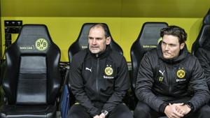 FILE - In this Saturday, Feb. 9, 2019 file photo Dortmund's assistant coaches Manfred Steves, left, and Edin Terzic sit beside the empty seat of head coach Lucien Favre, during the German Bundesliga soccer match between Borussia Dortmund and TSG 1899 Hoffenheim in Dortmund, Germany, . Borussia Dortmund has presented its new coach Edin Terzić. Dortmund fired Lucien Favre on Sunday after his team’s 5-1 defeat at home to Stuttgart the day before. (AP Photo/Martin Meissner, file)(AP) FILE - In this Saturday, Feb. 9, 2019 file photo Dortmund's assistant coaches Manfred Steves, left, and Edin Terzic sit beside the empty seat of head coach Lucien Favre, during the German Bundesliga soccer match between Borussia Dortmund and TSG 1899 Hoffenheim in Dortmund, Germany, . Borussia Dortmund has presented its new coach Edin Terzić. Dortmund fired Lucien Favre on Sunday after his team’s 5-1 defeat at home to Stuttgart the day before. (AP Photo/Martin Meissner, file)(AP)