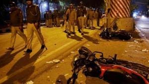 Damaged vehicles strewn near Jamia Millia Islamia University area following violence that erupted against Citizenship Amendment Act, in New Delhi on Dec. 15, 2019.(PTI) Damaged vehicles strewn near Jamia Millia Islamia University area following violence that erupted against Citizenship Amendment Act, in New Delhi on Dec. 15, 2019.(PTI)