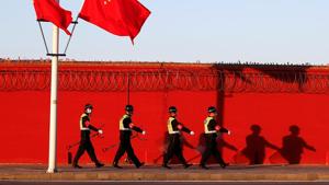 Riot police patrol the perimeter of the Capital International Airport during Chinese National Day holidays in Beijing, China.(REUTERS) Riot police patrol the perimeter of the Capital International Airport during Chinese National Day holidays in Beijing, China.(REUTERS)