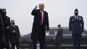 President Donald Trump gives a thumbs up as h arrives at New York Stewart International Airport in New Windsor, N.Y., Saturday, Dec. 12, 2020, before traveling on to the United States Military Academy in West Point, N.Y. to attend the 121st Army-Navy Football Game at Michie Stadium. (AP Photo/Andrew Harnik)(AP) President Donald Trump gives a thumbs up as h arrives at New York Stewart International Airport in New Windsor, N.Y., Saturday, Dec. 12, 2020, before traveling on to the United States Military Academy in West Point, N.Y. to attend the 121st Army-Navy Football Game at Michie Stadium. (AP Photo/Andrew Harnik)(AP)