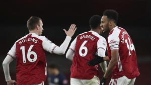 Arsenal's Pierre-Emerick Aubameyang, right, celebrates after scoring his side's first goal during an English Premier League soccer match between Arsenal and Southampton at the Emirates stadium in London, England, Wednesday, Dec. 16, 2020.(AP) Arsenal's Pierre-Emerick Aubameyang, right, celebrates after scoring his side's first goal during an English Premier League soccer match between Arsenal and Southampton at the Emirates stadium in London, England, Wednesday, Dec. 16, 2020.(AP)