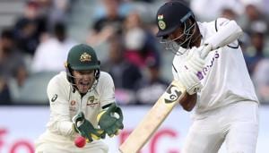 India's Cheteshwar Pujara, right, plays a shot in front of Australia's Tim Paine during their cricket test match at the Adelaide Oval in Adelaide, Australia, Thursday, Dec. 17, 2020.(AP) India's Cheteshwar Pujara, right, plays a shot in front of Australia's Tim Paine during their cricket test match at the Adelaide Oval in Adelaide, Australia, Thursday, Dec. 17, 2020.(AP)