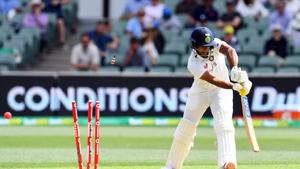 India's Mayank Agarwal is clean bowled by Australia's paceman Pat Cummins on day one of the first cricket Test match between Australia and India in Adelaide on December 17, 2020.(AFP) India's Mayank Agarwal is clean bowled by Australia's paceman Pat Cummins on day one of the first cricket Test match between Australia and India in Adelaide on December 17, 2020.(AFP)