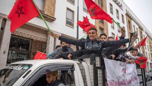 Moroccans celebrate in front of the parliament building in Rabat after the US adopted a new official map of Morocco that includes the disputed territory of Western Sahara.(AFP PHOTO.) Moroccans celebrate in front of the parliament building in Rabat after the US adopted a new official map of Morocco that includes the disputed territory of Western Sahara.(AFP PHOTO.)