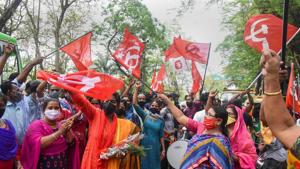 Left Democratic Front (LDF) supporters celebrate their party's lead in the Kerala local body elections in Kochi, Wednesday.(PTI Photo) Left Democratic Front (LDF) supporters celebrate their party's lead in the Kerala local body elections in Kochi, Wednesday.(PTI Photo)