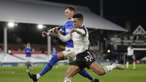 Soccer Football - Premier League - Fulham v Brighton & Hove Albion - Craven Cottage, London, Britain - December 16, 2020 Fulham's Antonee Robinson in action with Brighton & Hove Albion's Ben White(Pool via REUTERS) Soccer Football - Premier League - Fulham v Brighton & Hove Albion - Craven Cottage, London, Britain - December 16, 2020 Fulham's Antonee Robinson in action with Brighton & Hove Albion's Ben White(Pool via REUTERS)