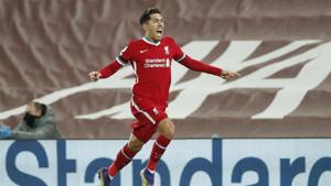 Soccer Football - Premier League - Liverpool v Tottenham Hotspur - Anfield, Liverpool, Britain - December 16, 2020 Liverpool's Roberto Firmino celebrates scoring their second goal(Pool via REUTERS) Soccer Football - Premier League - Liverpool v Tottenham Hotspur - Anfield, Liverpool, Britain - December 16, 2020 Liverpool's Roberto Firmino celebrates scoring their second goal(Pool via REUTERS)