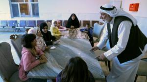A Kuwaiti volunteer trains blind girls to learn Arabic Language during a rehabilitation course, in Basra, Iraq.(Reuters) A Kuwaiti volunteer trains blind girls to learn Arabic Language during a rehabilitation course, in Basra, Iraq.(Reuters)