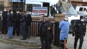 People, police and medics gather outside the privately-run Sanko University Hospital in Gaziantep, southeastern Turkey.(AP) People, police and medics gather outside the privately-run Sanko University Hospital in Gaziantep, southeastern Turkey.(AP)