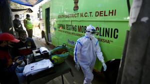 The National Expert Group on Vaccine Administration for Covid-19 (NEGVAC), headed by Dr Paul, has recommended that 10 million healthcare staff, 20 million frontline workers and 270 million people over the age of 50 or with co-morbidities be given the vaccines on priority once it becomes available.(AP) The National Expert Group on Vaccine Administration for Covid-19 (NEGVAC), headed by Dr Paul, has recommended that 10 million healthcare staff, 20 million frontline workers and 270 million people over the age of 50 or with co-morbidities be given the vaccines on priority once it becomes available.(AP)