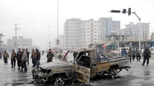 Afghan policemen inspect at the site of a blast in Kabul, Afghanistan.(Reuters) Afghan policemen inspect at the site of a blast in Kabul, Afghanistan.(Reuters)