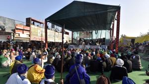 Farmers are seen sitting in protest against the new farm laws at Singhu border on Saturday.(Sanjeev Verma/HT Photo) Farmers are seen sitting in protest against the new farm laws at Singhu border on Saturday.(Sanjeev Verma/HT Photo)
