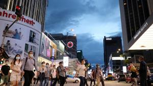 People wearing protective masks cross a street, amid the coronavirus disease (Covid-19) outbreak, in Kuala Lumpur, Malaysia.(Reuters/ File photo) People wearing protective masks cross a street, amid the coronavirus disease (Covid-19) outbreak, in Kuala Lumpur, Malaysia.(Reuters/ File photo)