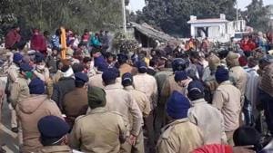 Police personnel at the site where two bike-borne young men fired on Jackie in Laksar area of Haridwar district on Monday.(HT PHOTO.) Police personnel at the site where two bike-borne young men fired on Jackie in Laksar area of Haridwar district on Monday.(HT PHOTO.)