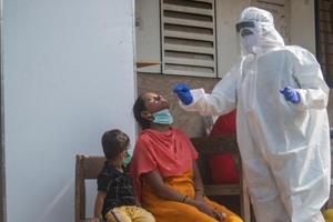 A health care worker in Mumbai, December 17, 2020(Pratik Chorge/Hindustan Times)) A health care worker in Mumbai, December 17, 2020(Pratik Chorge/Hindustan Times))