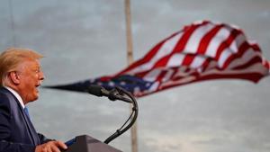 FILE PHOTO: President Donald Trump speaks, with a flag behind him, during a campaign rally at Cecil Airport in Jacksonville, Florida, U.S., September 24, 2020. REUTERS/Tom Brenner/File Photo(REUTERS) FILE PHOTO: President Donald Trump speaks, with a flag behind him, during a campaign rally at Cecil Airport in Jacksonville, Florida, U.S., September 24, 2020. REUTERS/Tom Brenner/File Photo(REUTERS)