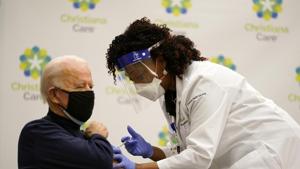 President-elect Joe Biden receives his first dose of the coronavirus vaccine at ChristianaCare Christiana Hospital in Newark, Delaware.(AP) President-elect Joe Biden receives his first dose of the coronavirus vaccine at ChristianaCare Christiana Hospital in Newark, Delaware.(AP)