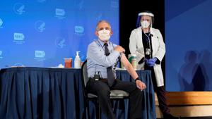 Anthony Fauci was among the first employees of the National Institutes of Health to get a Covid-19 vaccine, administered in the same auditorium where he first arrived at the NIH as a fellow 52 years ago(REUTERS) Anthony Fauci was among the first employees of the National Institutes of Health to get a Covid-19 vaccine, administered in the same auditorium where he first arrived at the NIH as a fellow 52 years ago(REUTERS)