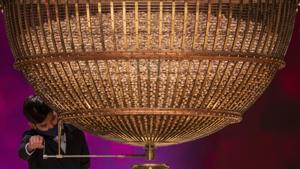 A ball bearing a ticket number falls from a giant drum at Madrid's Teatro Real opera house during Spain's bumper Christmas lottery draw known as El Gordo, or The Fat One, in Madrid, Spain.(AP) A ball bearing a ticket number falls from a giant drum at Madrid's Teatro Real opera house during Spain's bumper Christmas lottery draw known as El Gordo, or The Fat One, in Madrid, Spain.(AP)