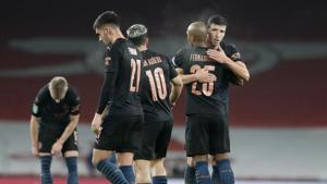 Manchester City players celebrate after their 4-1 win over Arsenal in their English League Cup quarterfinal soccer match at Emirates Stadium, London, Tuesday, Dec. 22, 2020.(AP) Manchester City players celebrate after their 4-1 win over Arsenal in their English League Cup quarterfinal soccer match at Emirates Stadium, London, Tuesday, Dec. 22, 2020.(AP)