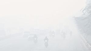 Commuters drive through a thick layer of smog at Azadpur road in New Delhi on December 23. Delhi’s air quality continued to remain in the severe category on December 23 morning, with the average hourly air quality index (AQI) reading reaching 435 at 7am, HT reported. (Sanchit Khanna / HT Photo) Commuters drive through a thick layer of smog at Azadpur road in New Delhi on December 23. Delhi’s air quality continued to remain in the severe category on December 23 morning, with the average hourly air quality index (AQI) reading reaching 435 at 7am, HT reported. (Sanchit Khanna / HT Photo)