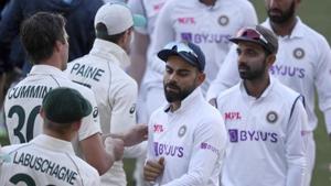 India's Virat Kohli, center, shakes hands with Australian players on the third day of their cricket test match at the Adelaide Oval in Adelaide, Australia, Saturday, Dec. 19, 2020. Australia won the match.(AP) India's Virat Kohli, center, shakes hands with Australian players on the third day of their cricket test match at the Adelaide Oval in Adelaide, Australia, Saturday, Dec. 19, 2020. Australia won the match.(AP)