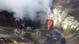 Kilauea volcano within Hawaii Volcanoes National Park on the Big Island was gushing molten rock from at least two vents inside its summit crater, the US Geological Survey said. A lava lake has formed, rising about 440 feet (134 meters) from the bottom of the crater.(AP) Kilauea volcano within Hawaii Volcanoes National Park on the Big Island was gushing molten rock from at least two vents inside its summit crater, the US Geological Survey said. A lava lake has formed, rising about 440 feet (134 meters) from the bottom of the crater.(AP)