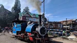 Much to the delight of tourists flocking to the hills in the festive season, joy rides of the famed toy train of Darjeeling Himalayan Railway (DHR) will resume from Christmas.(Yahoo) Much to the delight of tourists flocking to the hills in the festive season, joy rides of the famed toy train of Darjeeling Himalayan Railway (DHR) will resume from Christmas.(Yahoo)