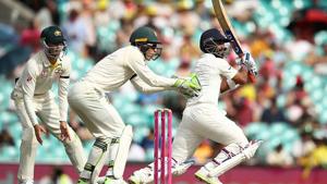 Ajinkya Rahane plays a shot as Tim Paine looks on.(Getty Images) Ajinkya Rahane plays a shot as Tim Paine looks on.(Getty Images)