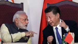 In this Oct 2016 file photo, Indian Prime Minister Narendra Modi, left, talks with Chinese President Xi Jinping at the signing ceremony by foreign ministers during the BRICS summit in Goa, India.(AP) In this Oct 2016 file photo, Indian Prime Minister Narendra Modi, left, talks with Chinese President Xi Jinping at the signing ceremony by foreign ministers during the BRICS summit in Goa, India.(AP)
