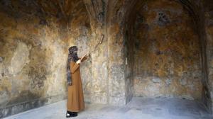 A female artist volunteer cleans a room of the long-abandoned 200-year-old al-Kamalaia school, in the old quarter of Gaza City.(AP) A female artist volunteer cleans a room of the long-abandoned 200-year-old al-Kamalaia school, in the old quarter of Gaza City.(AP)