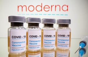 Vials with a sticker reading, Vials with a sticker reading,